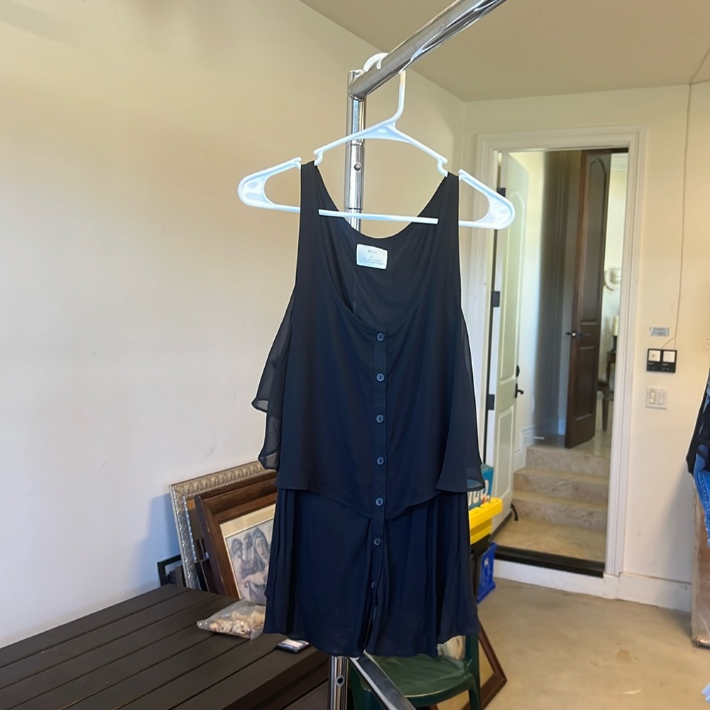 NWOT! Pins and needles beautiful black flowy blouse. Size large.